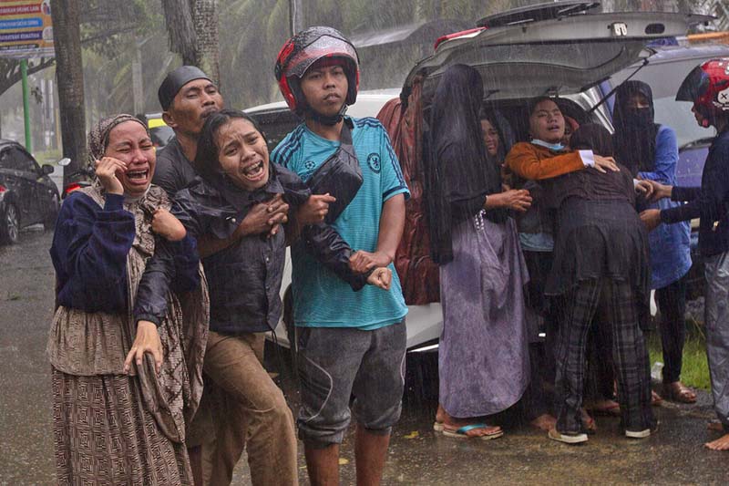 At least 42 dead as Indonesia quake topples homes, buildings